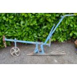Blue painted horse drawn plough - 58cm wide x 160cm long Please note descriptions are not