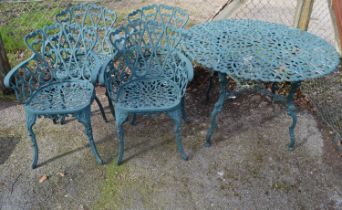Green painted metal garden table - 106cm x 70cm tall together with four matching elbow chairs Please