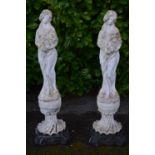 Pair of statues of young ladies, standing on plinth bases - 32cm x 115cm tall Please note