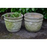 Pair of circular planters with floral decoration - 41cm x 37cm tall Please note descriptions are not