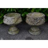 Pair of shallow circular leaf decorated urns - 46cm dia x 51cm tall Please note descriptions are not