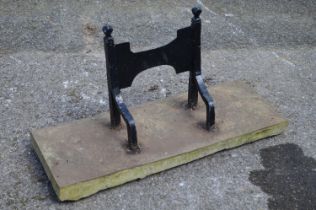 Painted boot scraper mounted on stone base - 59cm wide Please note descriptions are not condition