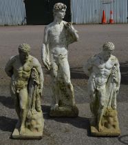 Single statue of a nude male - 83cm tall together with a pair of male nude statues - 59cm tall