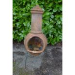 Terracotta effect chiminea on metal stand - 45cm x 115cm tall Please note descriptions are not