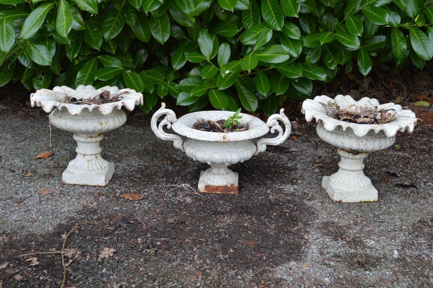 Pair of shallow painted iron urns - 32cm x 27cm tall together with one other iron two handled