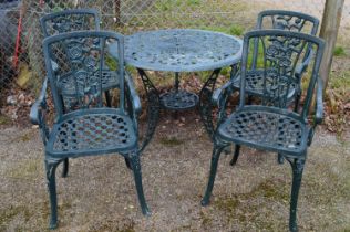 Green painted aluminium garden table and four elbow chairs with rose decoration - table 92cm x