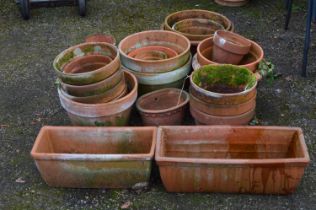 Quantity of terracotta plant pots of varying shapes and sizes Please note descriptions are not