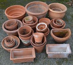 Quantity of terracotta plant pots of various sizes Please note descriptions are not condition