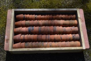 Approx ninety small terracotta plant pots - approx 7cm tall each Please note descriptions are not