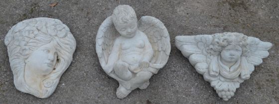 Cherub wall plaques - 29cm wide together with two wall pockets Please note descriptions are not