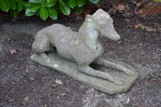 20th century statue of a recumbent Greyhound - 64cm long Please note descriptions are not