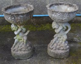 Pair of cherub formed planters - 27cm x 49cm tall Please note descriptions are not condition