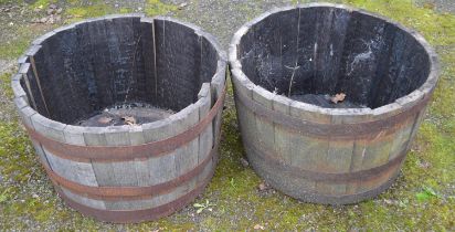 Two oak half barrel planters - 64cm dia x 40cm tall Please note descriptions are not condition