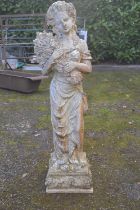 Weathered resin figure of a young lady holding wheat - 92cm tall Please note descriptions are not