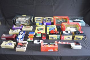Quantity of boxed and loose model vehicles to include: Burago, Atlas and Lledo etc Please note