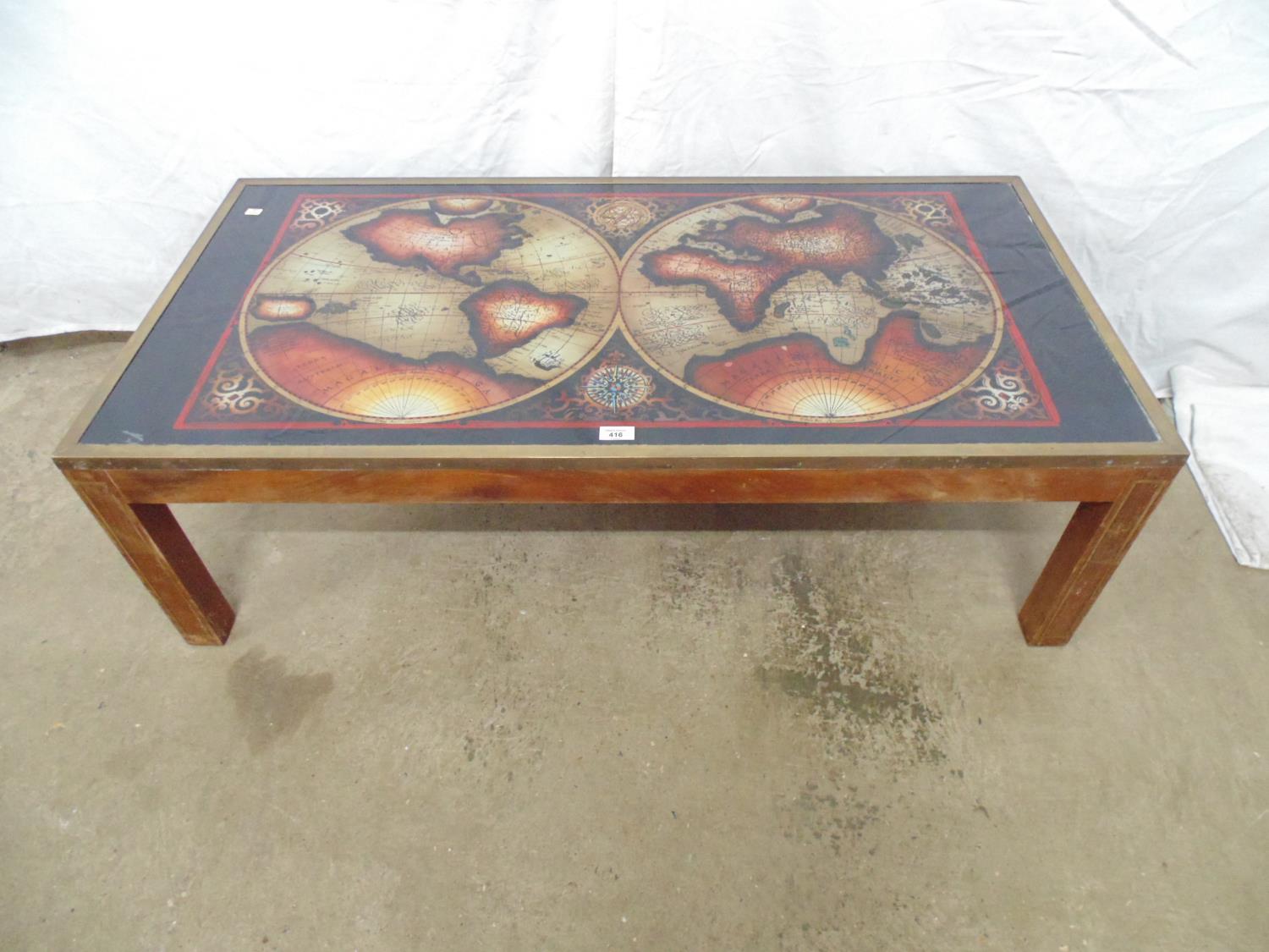 Circa 1970's mahogany brass bound and inlaid low coffee table the glass top with world map design,