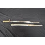 French brass handle bayonet with metal scabbard having inscription and dated 1873 to spine of