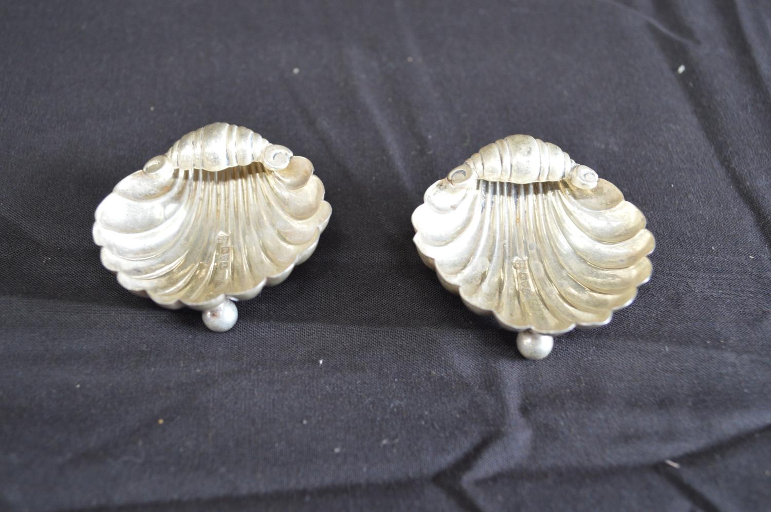 Pair of shell formed silver salts each standing on ball and ball feet, hallmarked for Chester (0. - Image 3 of 5