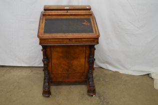 Victorian walnut Davenport desk the front lifting to reveal fitted drawers over a bank of four right