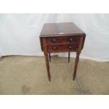 Mahogany drop flap work table having two drawers and two faux drawers with wooden knob handles,