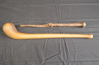 Wooden throwing knobkerrie - 46.5cm long together with a woven leather priest with leather wrist