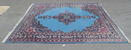 Blue ground carpet having black, red and white pattern with end tassels - 3.95m x 3m Please note