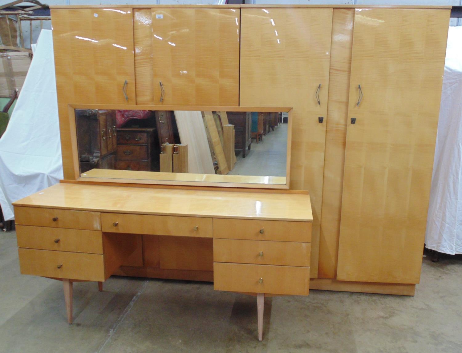 Mid century gloss maple finish three piece bedroom suite to comprise: one double wardrobe with doors