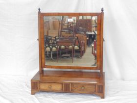 Mahogany box base swivel mirror having two small drawers, standing on bracket feet - 57cm x 24cm x