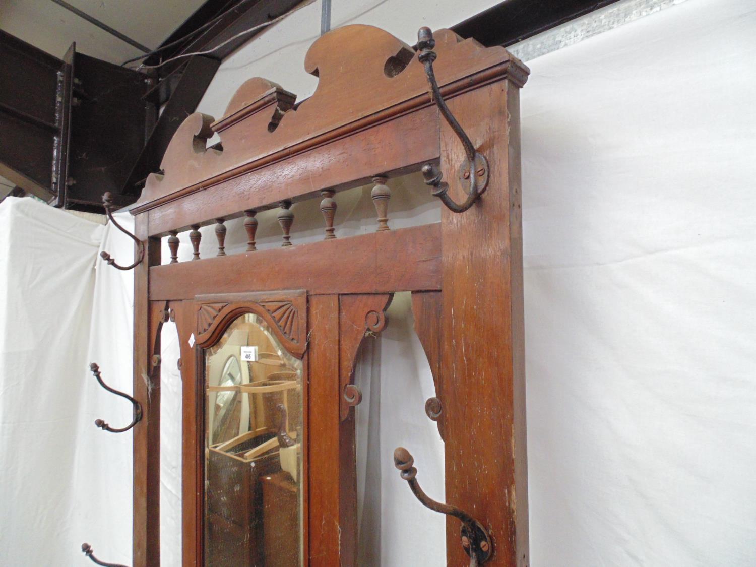19th century mahogany hall standing having seven hooks (some side hooks missing), a central mirror - Image 2 of 4
