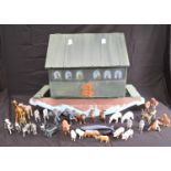 Painted wooden rocking Noah's Ark together with a quantity of plastic animals - 86.5cm x 61.5cm tall