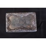 Georgian silver snuff box having floral decoration and personalised engraving, the inside having a