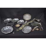 Quantity of silverplate together with horse brasses and iron trivet Please note descriptions are not