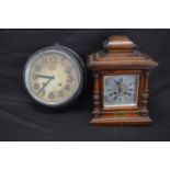 Walnut cased mantle clock having silvered paper dial, black Roman Numerals and black hands - 29cm