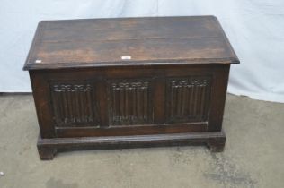 20th century oak linen fold front coffer, standing on bracket feet - 91cm x 45cm x 53cm tall