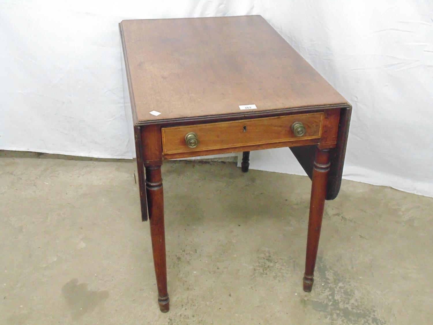 Mahogany Pembroke table having inlaid drawer to one end and faux drawer to the other, standing on