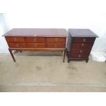 Stag Minstrel chest having six short drawers, standing on square tapering legs - 131cm x 47cm x 73cm