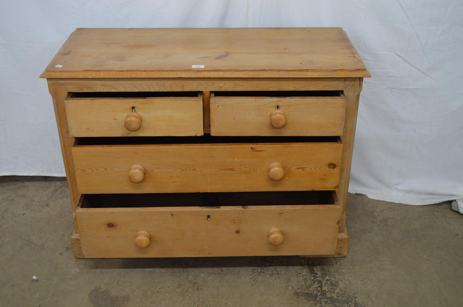 Victorian pine chest of two short and two long drawers with turned knob handles, the top having - Image 2 of 4