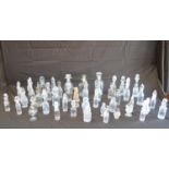 Collection of cut glass stoppered bottles, pepper shakers and decanters Please note descriptions are