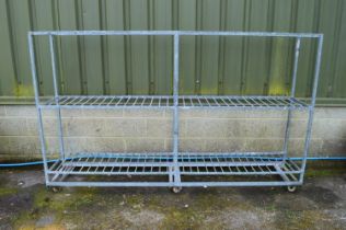 Heavy galvanised three tier shelves on six castors - 249cm x 46cm x 153.5cm tall Please note