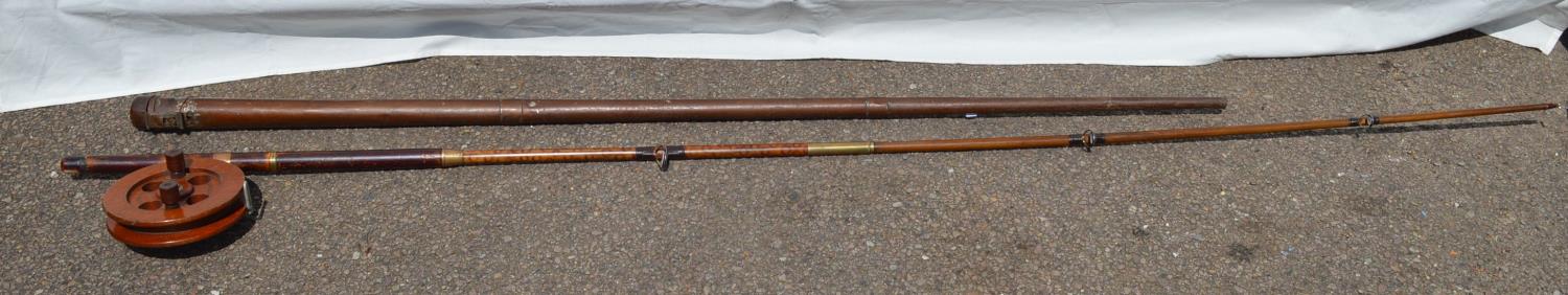 Two piece cane fishing rod with later replacement end and wooden reel together with a Horace Lindrum