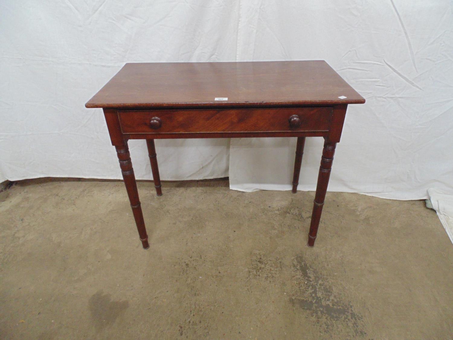 Mahogany single drawer side table with wooden turned handles, standing on four turned legs - 84cm