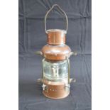 Un-named copper 360 degree anchor lantern with brass mounts - 33cm tall Please note descriptions are