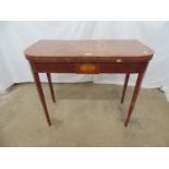 Inlaid mahogany fold over top card table having central cartouche opening to green baized playing