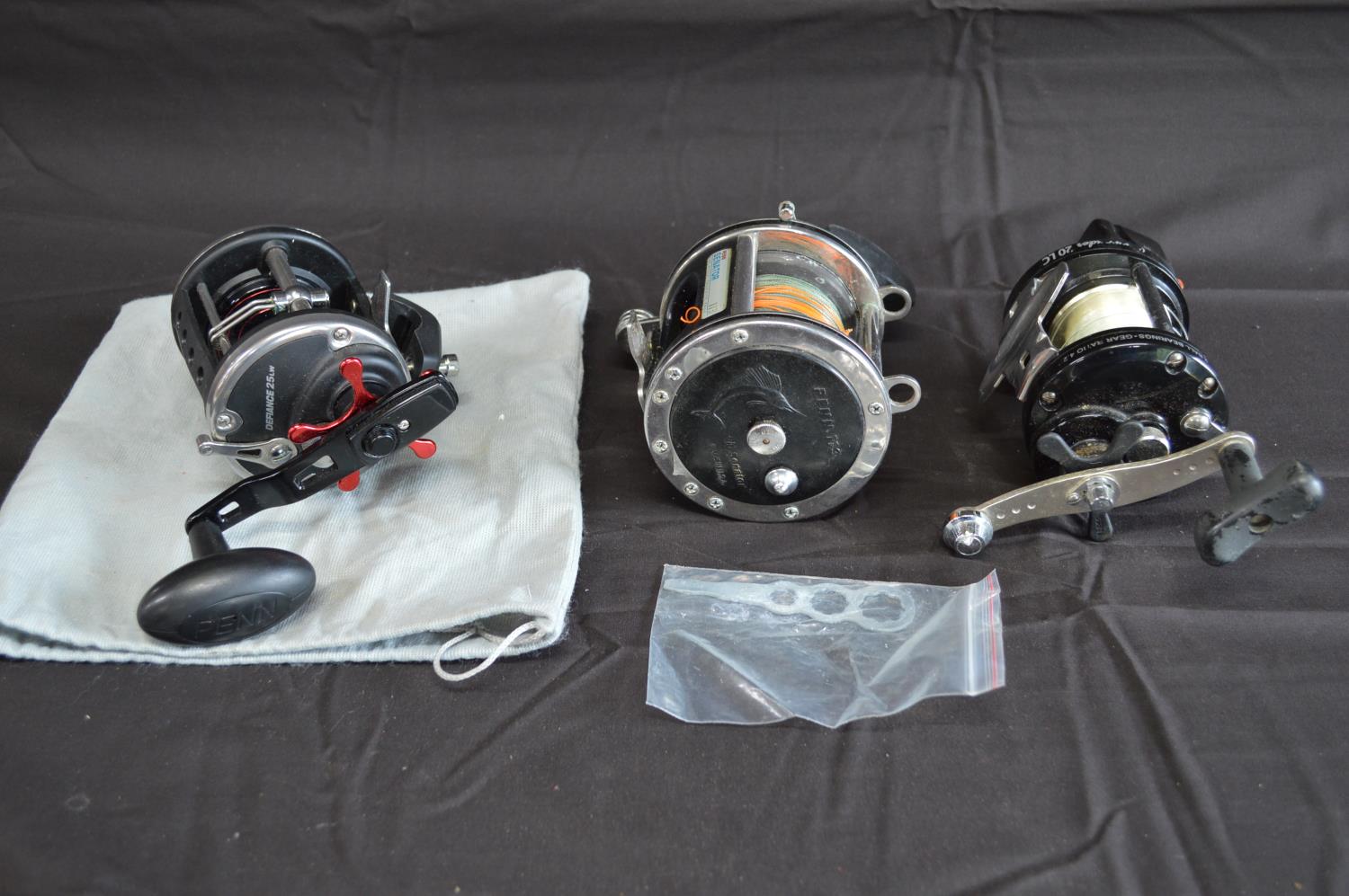 Group of three Penn fishing reels to comprise: Defiance 25LW, Commander and 113 4/0 Senator Please - Image 2 of 5