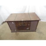 Metal sided and bound trunk with wooden lift up lid and wooden plinth base with side carrying