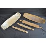 Group of three textured and pastry cutting treen rolling pins - longest 60cm together with two