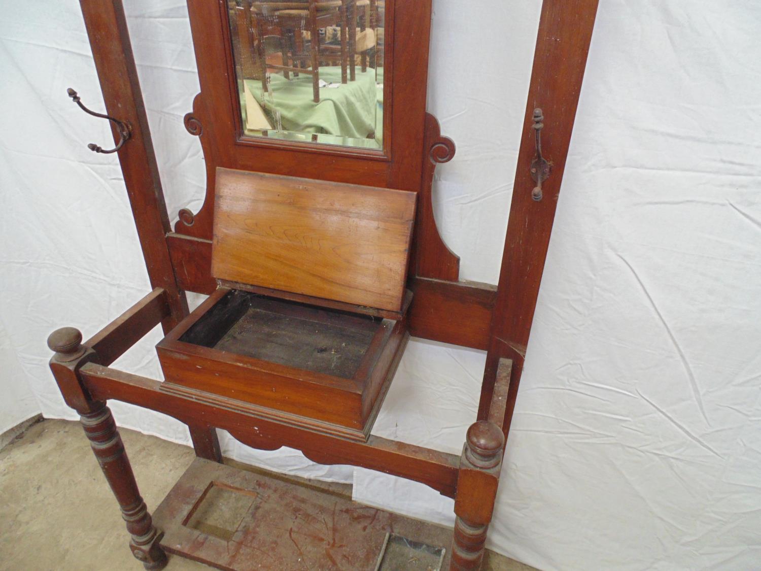 19th century mahogany hall standing having seven hooks (some side hooks missing), a central mirror - Image 3 of 4