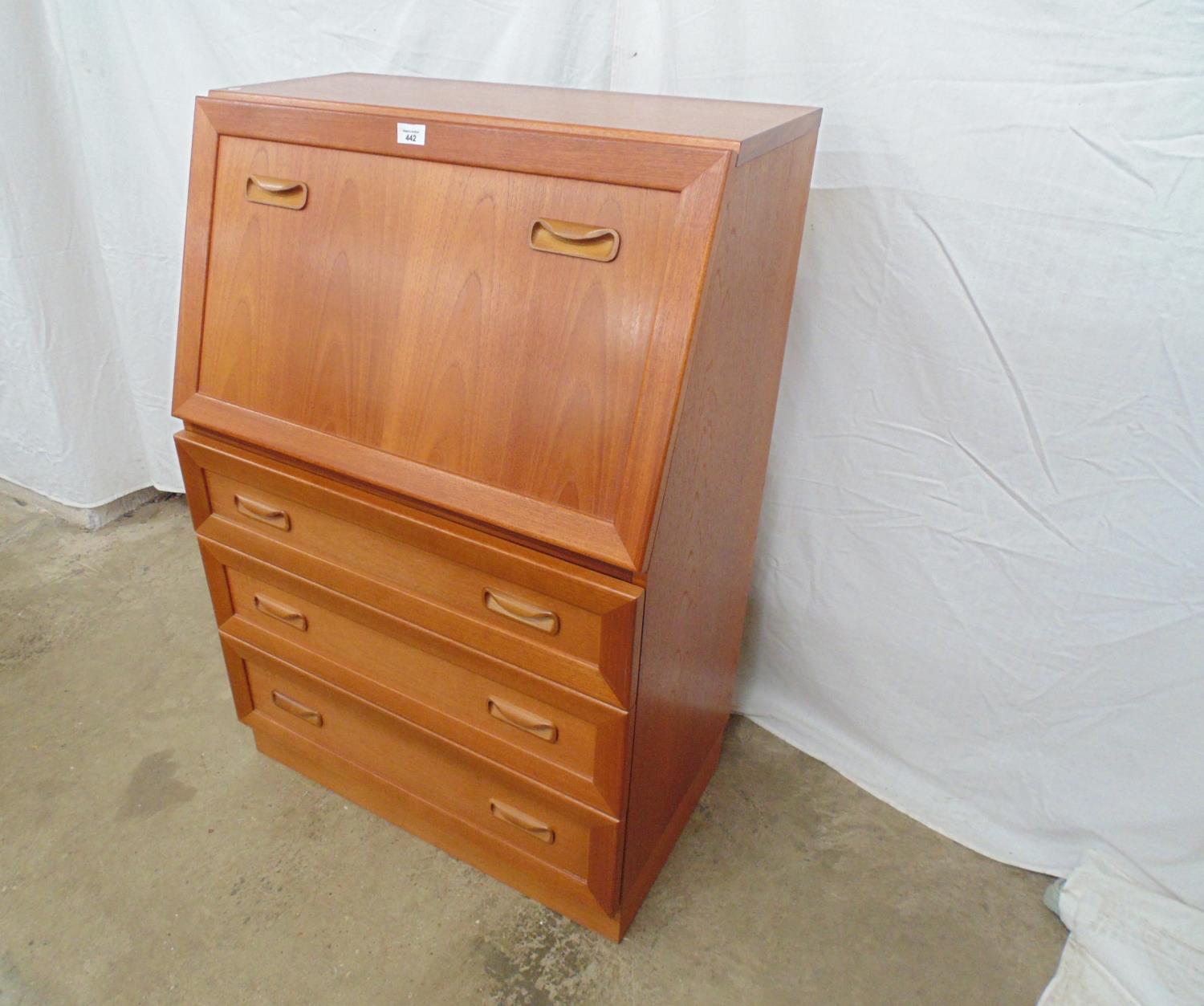 Mid century teak bureau the fall front opening to pigeon holes and a single drawer over three - Image 2 of 4