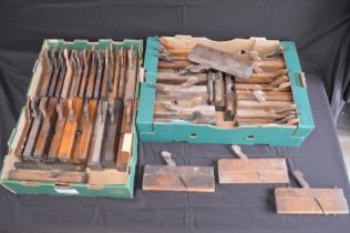 Collection of fifty five wooden vintage moulding planes. Please note descriptions are not
