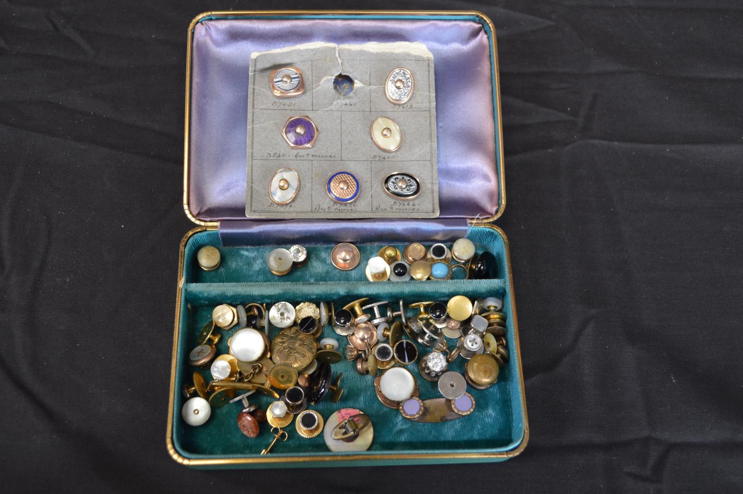 Box containing a collection of yellow metal and other gentleman's studs Please note descriptions are